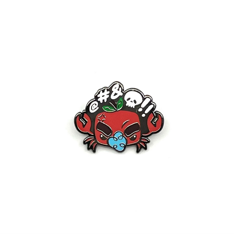 Decorative pin with a red crab design on a white background